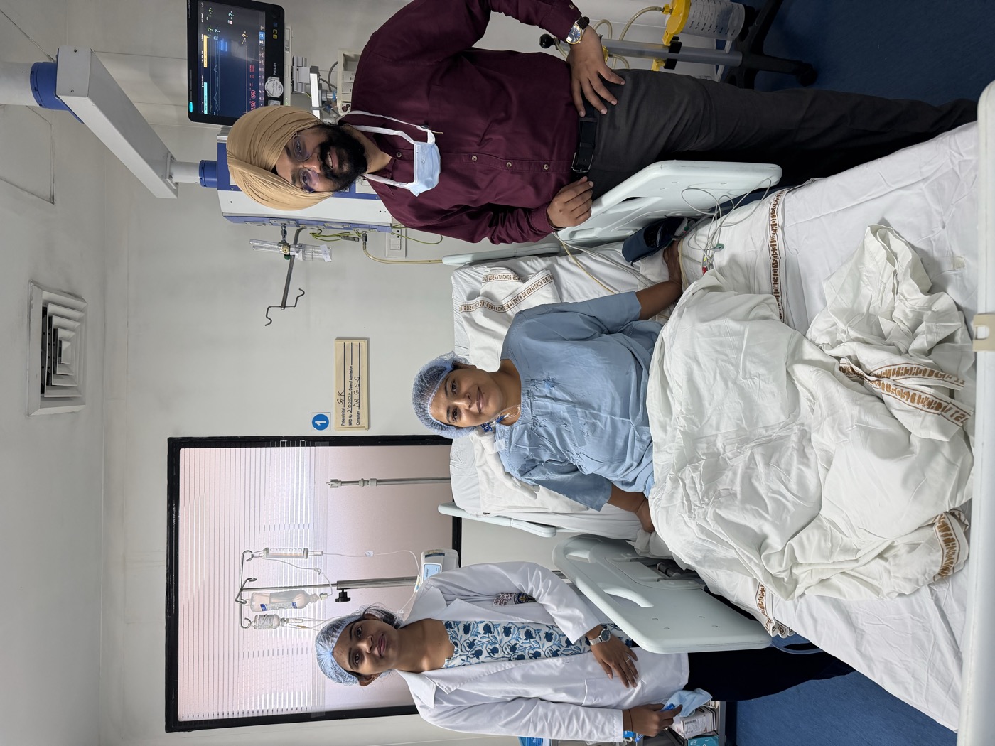 Dr. Sahota with a recovering patient